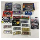 20 toy race cars all sealed in packages