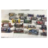 20 toy race cars all sealed in packages