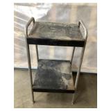 Metal table approximately by 14 x 32 tall