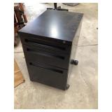 Metal three drawer file cabinet broken wheel
