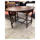 Oval drop leaf table approximately 50 x 44 x 30