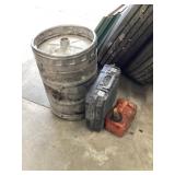 Empty keg and gas can