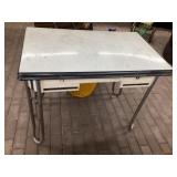 Enamel top table approximately 25 x 40 x 31 tall