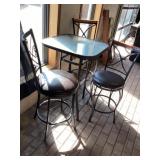 Table and three chairs approximately 27 x 27 x 3