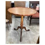 Hi crust table approximately 26 inches across by