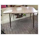 Drop leaf Approximately 48 x 30 with the leaves up