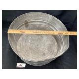 Galvanized wash tub approximately 23 inches across