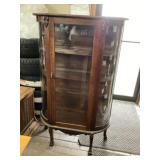 Curved glass China cabinet approximately 36 x 14