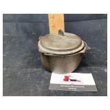 Cast-iron Wagner ware hot pot with marbles