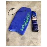 Boogie board and sunscreen