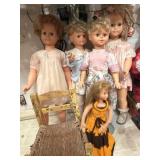 Oversized Dolls and wood chair