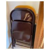 Metal chairs and umbrella