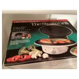 Steam grill and rotisserie