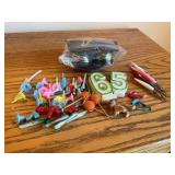 Candles, cake decoration and paper products