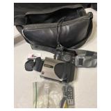 Vintage sharp view can and Olympus camera