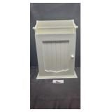White wooden medicine cabinet