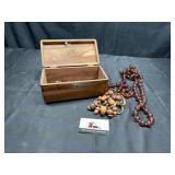 Costume jewelry in wooden box
