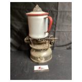 Antique kerosene burner and enamel pitcher