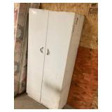 metal shelving unit with doors approximately