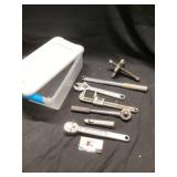 Miscellaneous tools in clear tote with lid