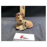 Lamb and lion figures