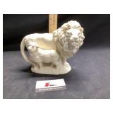 Lamb and lion figures