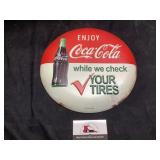 Metal Coca-Cola sign 12 inches across