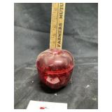 Plastic apple with marbles