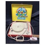 Smurfs record player turns on