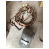 Cutting torch with shield