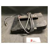 Samsung DVD player turns on