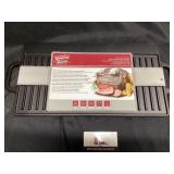 Cast-iron reversible griddle new
