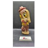 Chalkware dog coin bank