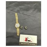 Amitron watch and green earrings