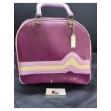 Vintage purple bowling ball in bag