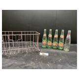 Vintage wire basket and glass pop bottles