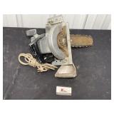 Powr-kraft saw with chainsaw attachment.