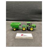 ERTL John Deere tractor and a wagon grain trailer