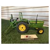 John Deere 950 and back hoe