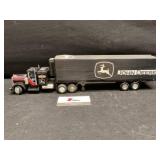 Truck nd trailer. John Deere stickers. Not a J