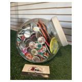 Glass jar of union pins