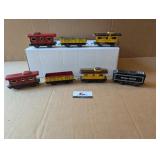 7 Marx Tin Litho train cars/cabooses