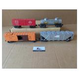 4 Lionel O gauge train cars/caboose