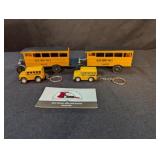 2 BlueBird No. 1 buses (plastic), 2 die-cast bus