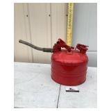 Metal gas can. Possibly 3 gallon.