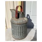 Galvanized water can
