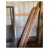 Approximately 8- 7 foot two by fours