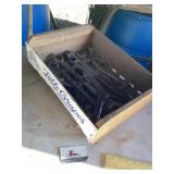 Wooden table grapes crate of wrenches