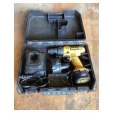 DeWalt 9.6 V drill with battery and charger