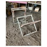 Metal sawhorses approximately 21 inches tall